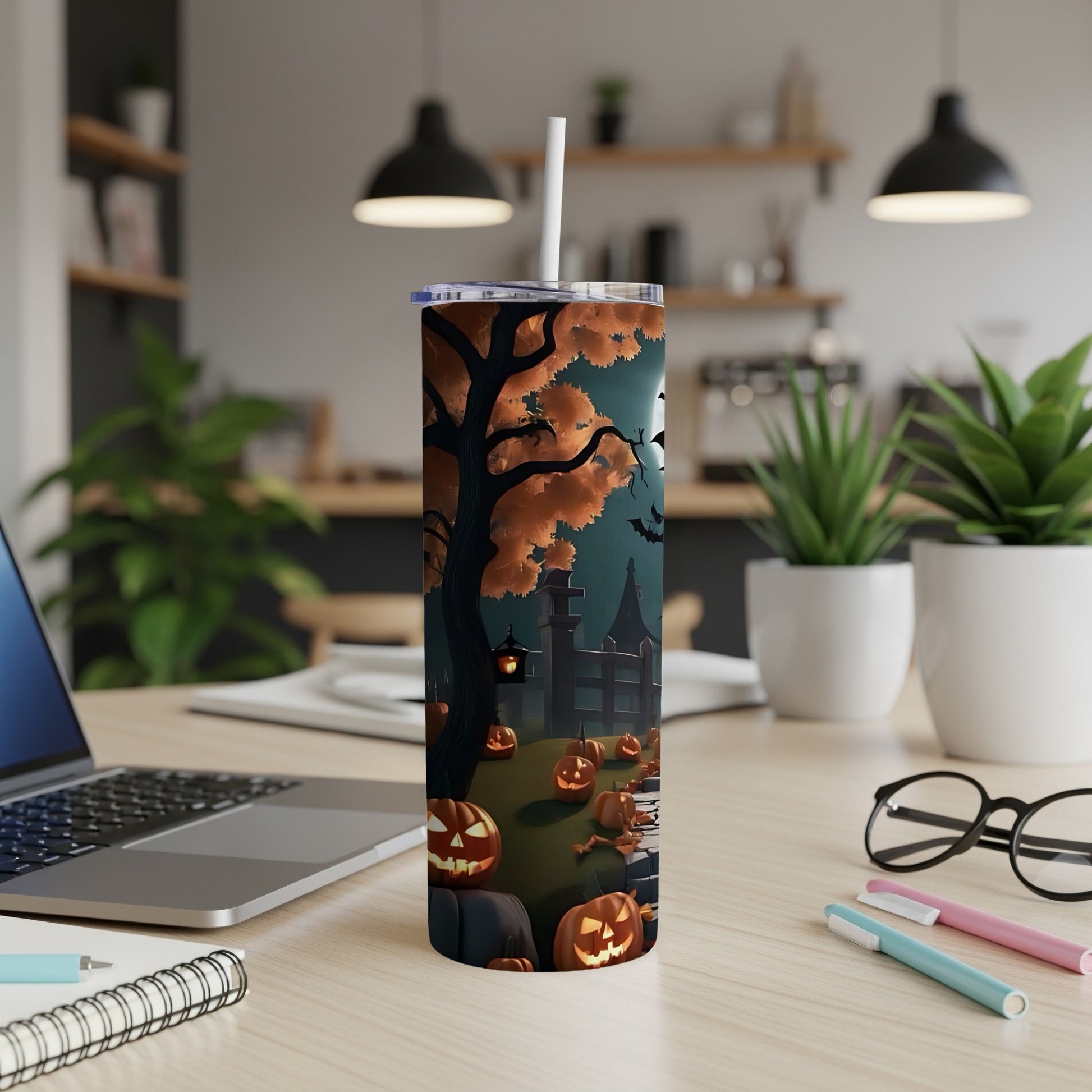 Tall tumbler with a Halloween scene featuring pumpkins, a spooky tree, and bats.