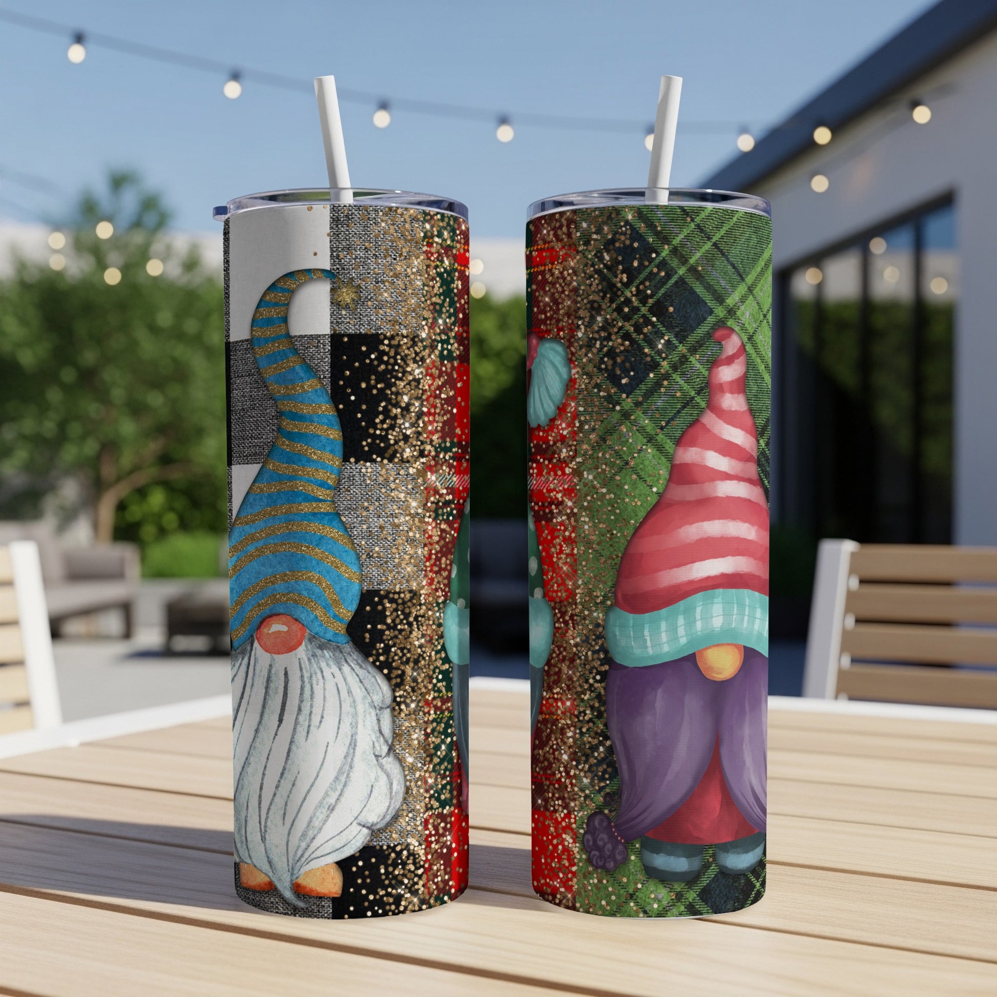 Two tumblers with gnome designs and festive patterns, one with plaid.