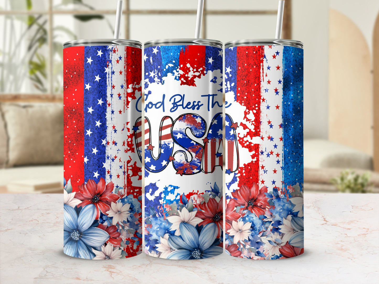Three tumblers with American flag pattern and floral accents, "God Bless The USA" text.