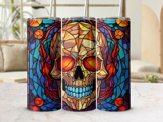 Stained glass skull tumbler with colorful geometric patterns and straw.