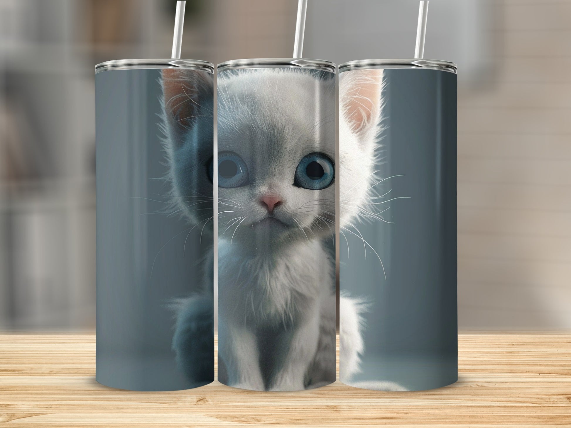 Three tumblers featuring a cute white kitten with blue eyes.