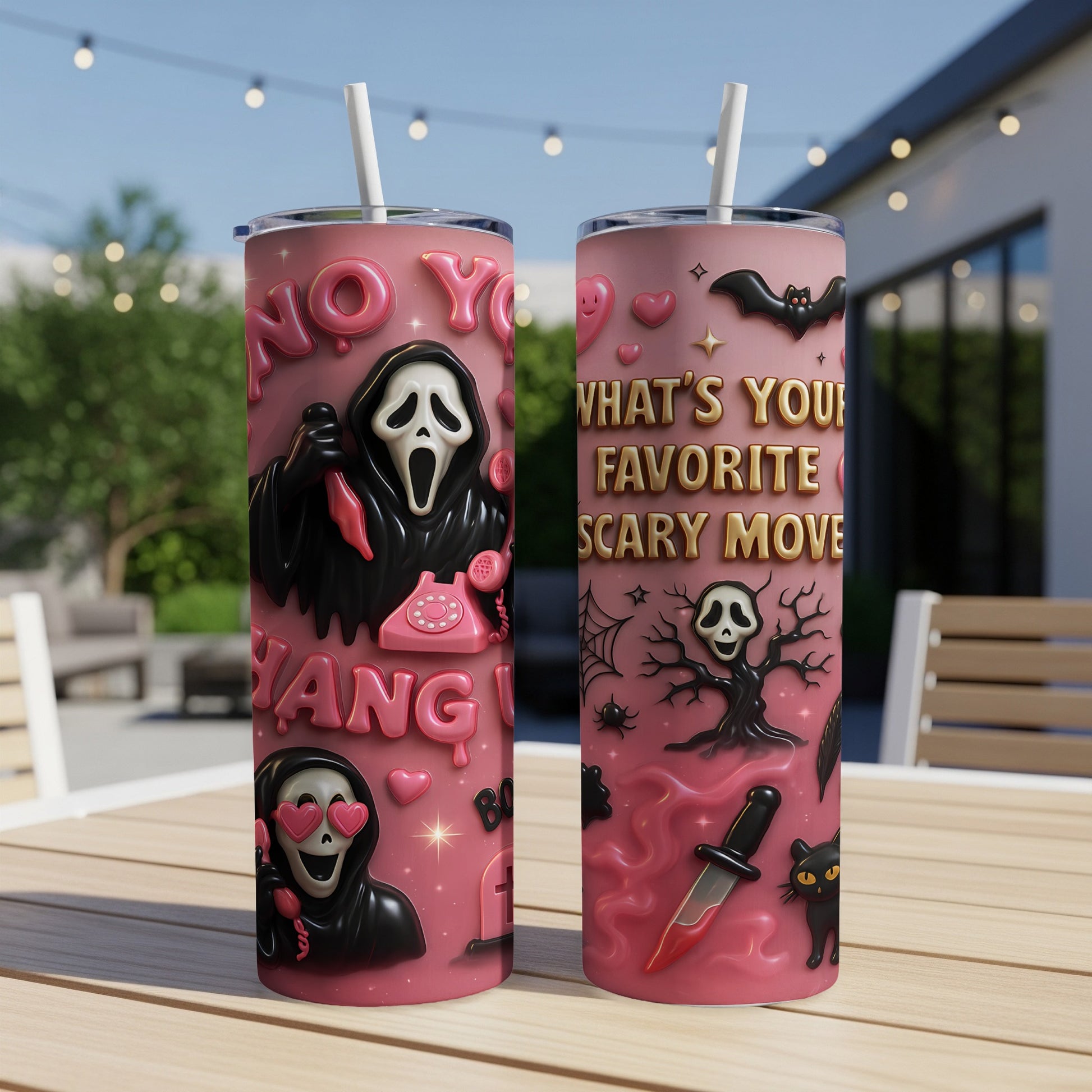 Two pink tumblers with horror-themed graphics, one saying "NO YO," the other "WHAT'S YOUR FAVORITE SCARY MOVIE."