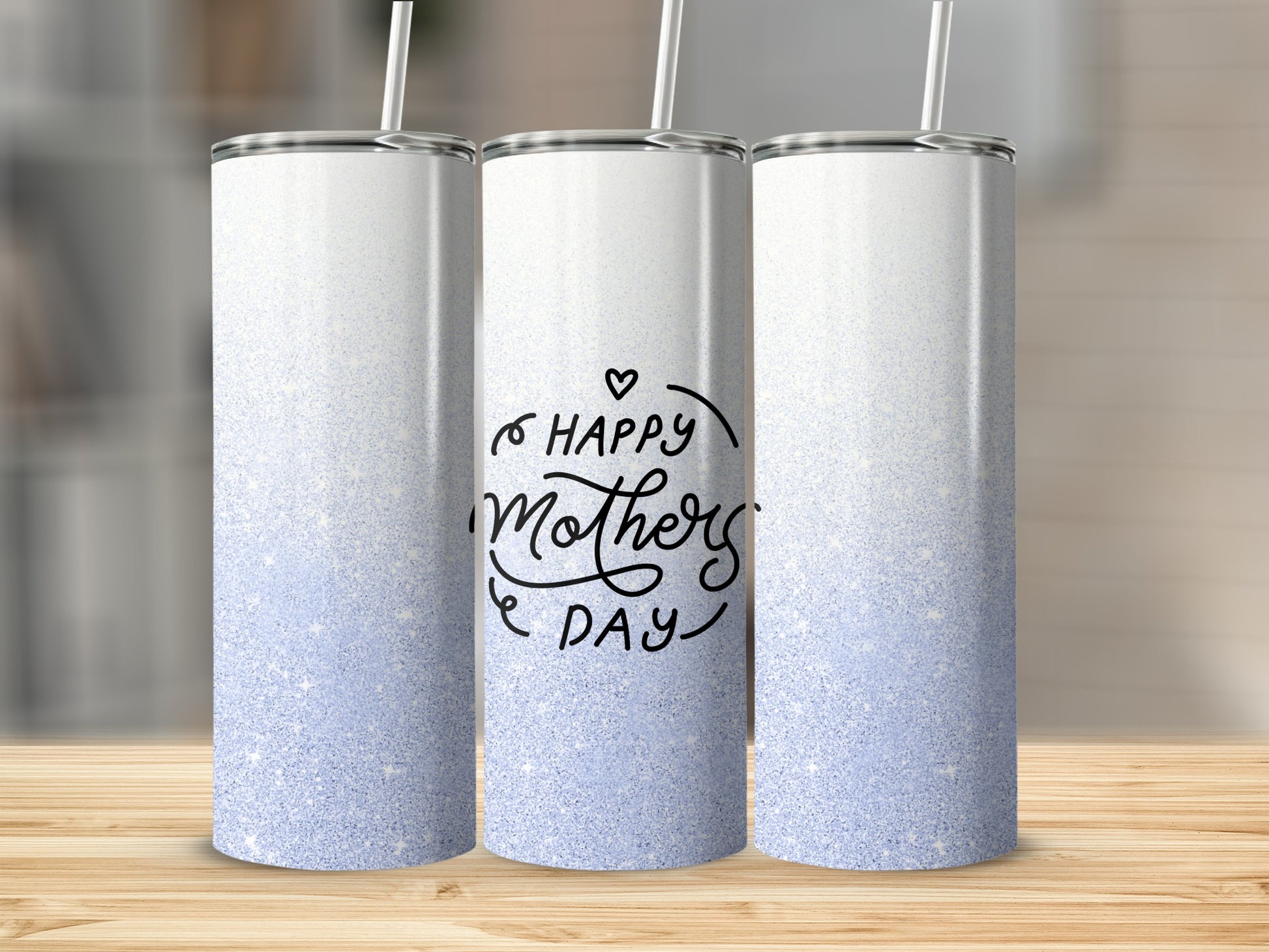 Three white tumblers with blue glitter gradient and "Happy Mother's Day" text.