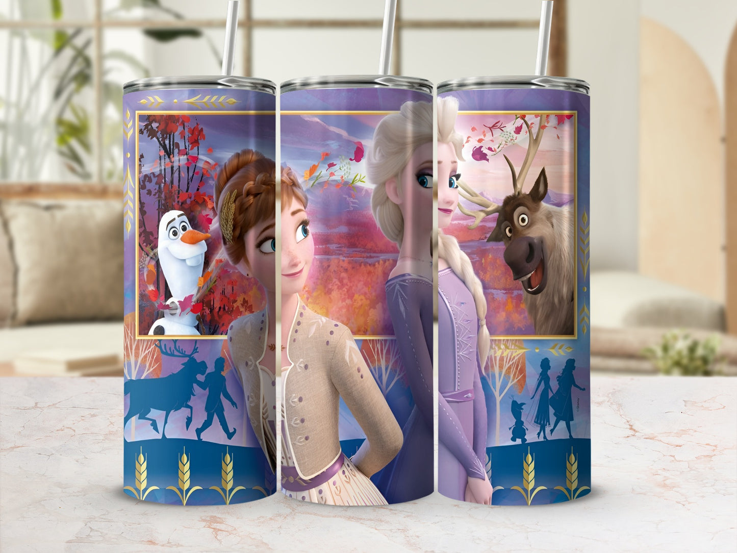 Frozen characters Anna, Elsa, and Sven on a decorative tumbler.