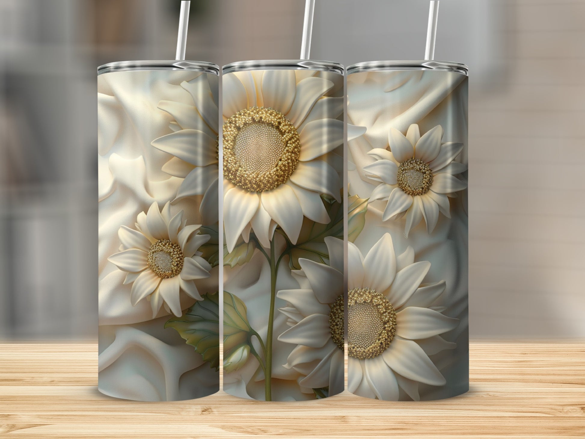 Three tumblers with embossed white sunflowers and green leaves design.