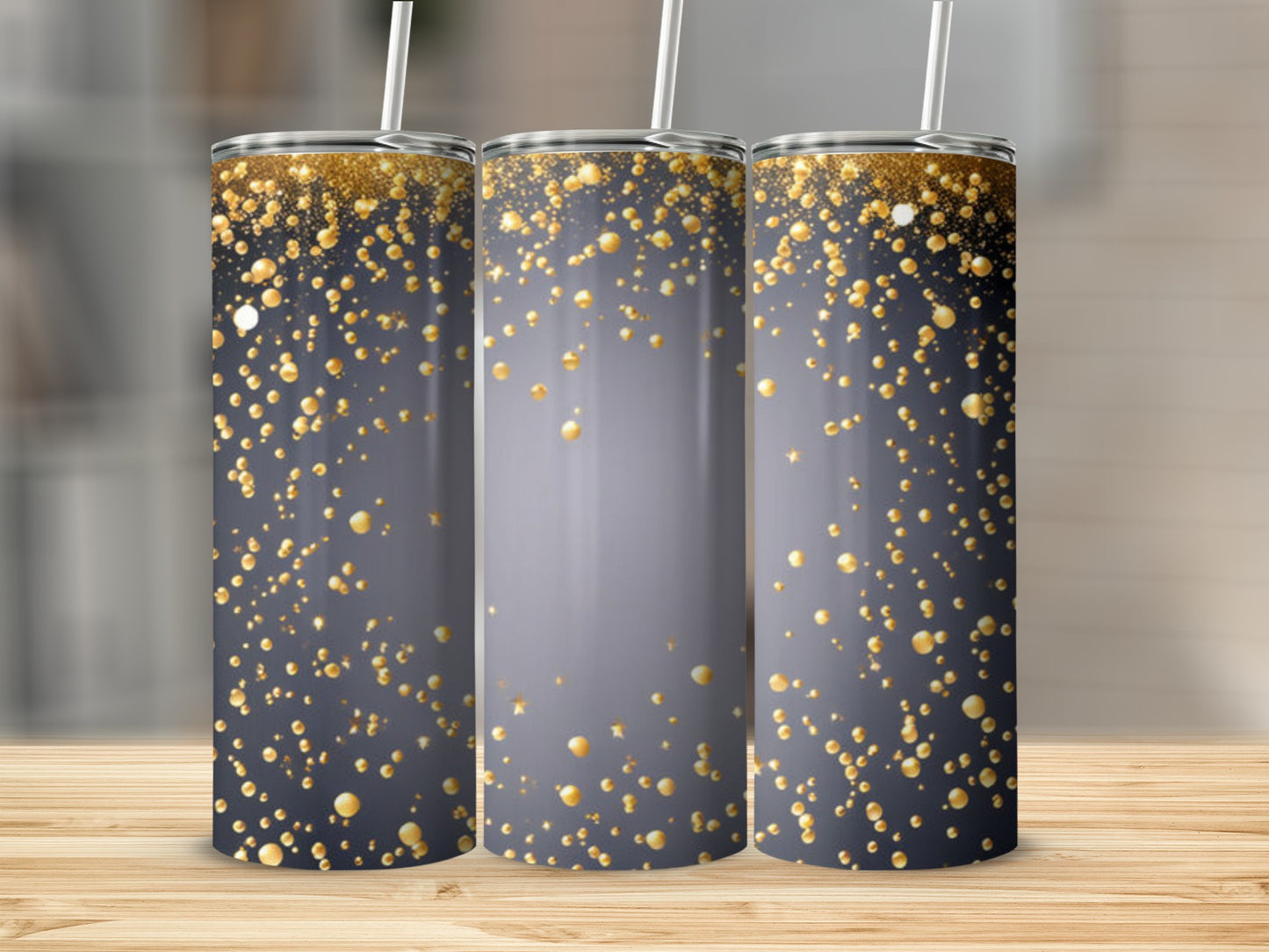 Three tumblers with gold glitter and bokeh dots on a gray gradient.