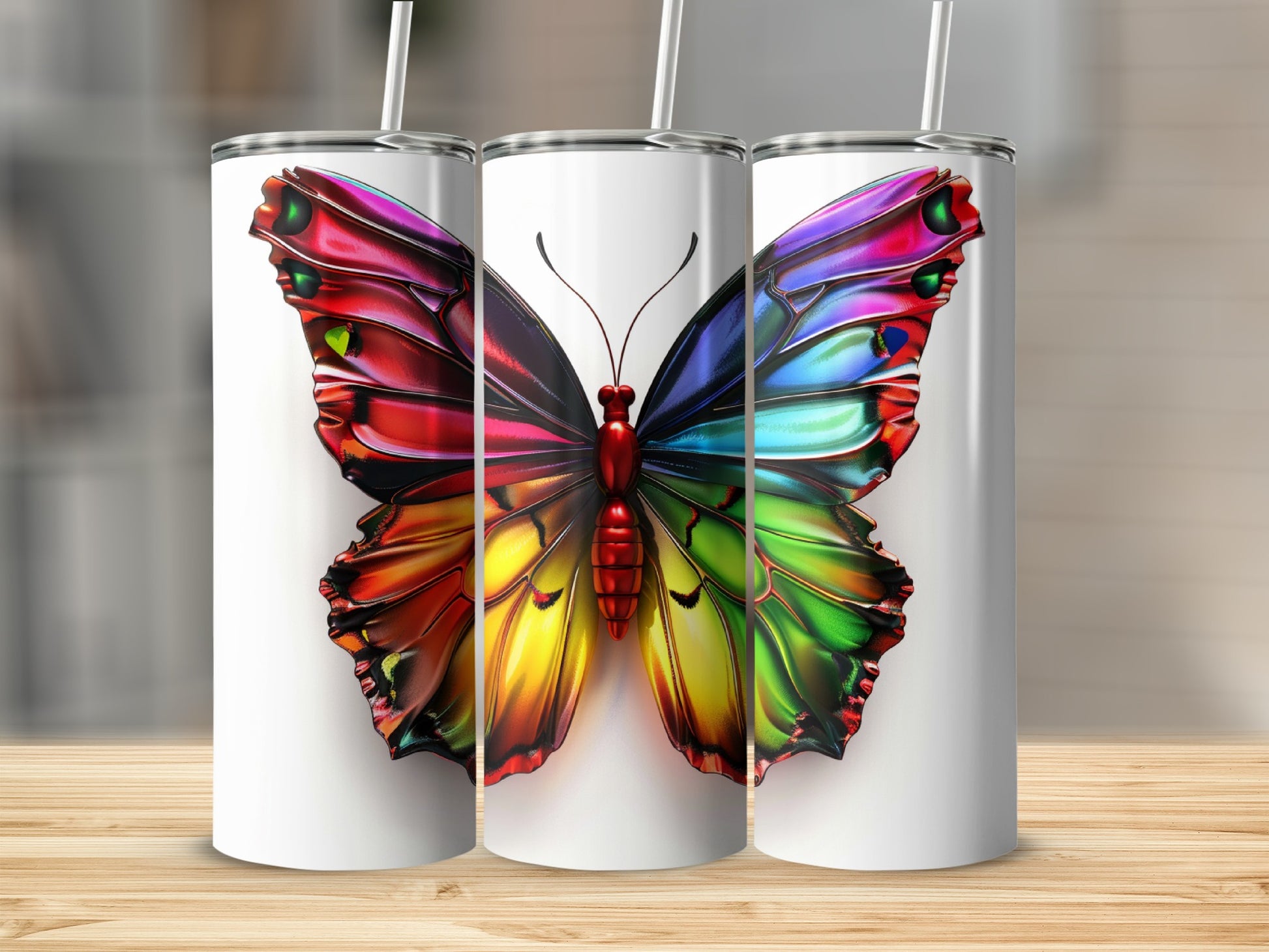 Three white tumblers featuring a vibrant, iridescent butterfly design.