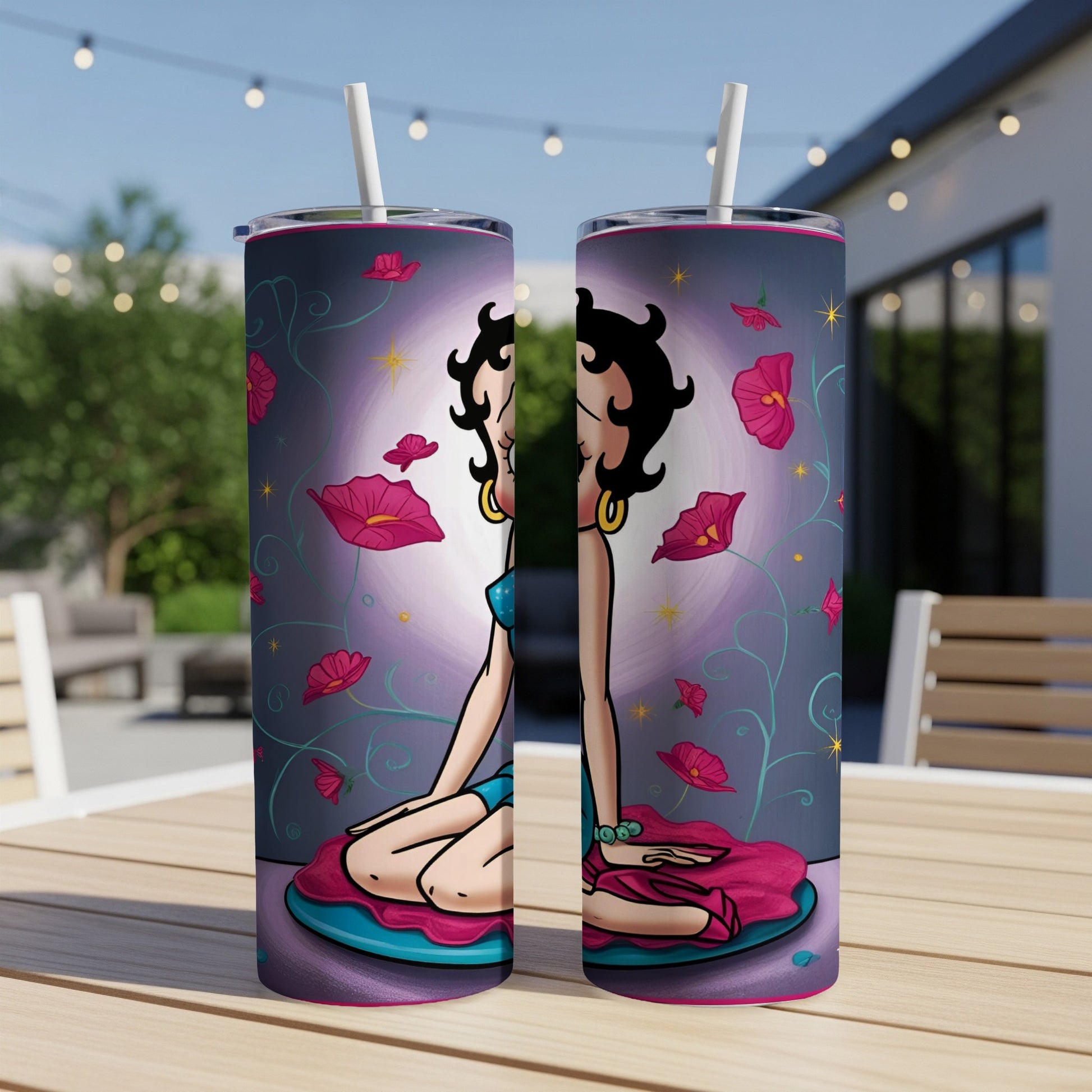 Betty Boop sits meditating surrounded by pink flowers.