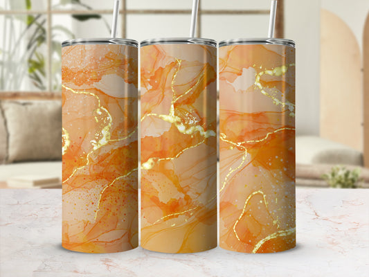 Three tumblers with an abstract orange and gold marble design.