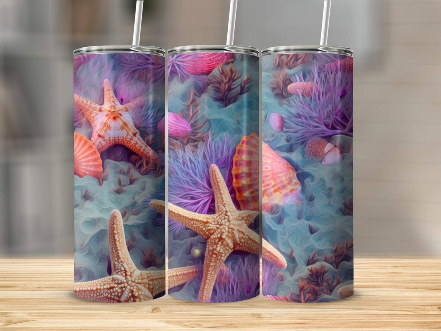 Three tumblers with starfish and seashells in purple and blue ocean background.