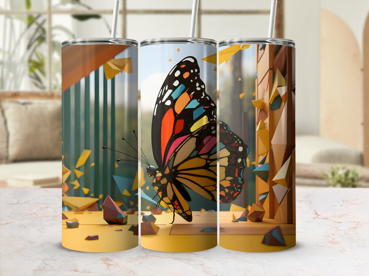 Three tumblers with colorful butterfly designs and abstract geometric shapes.