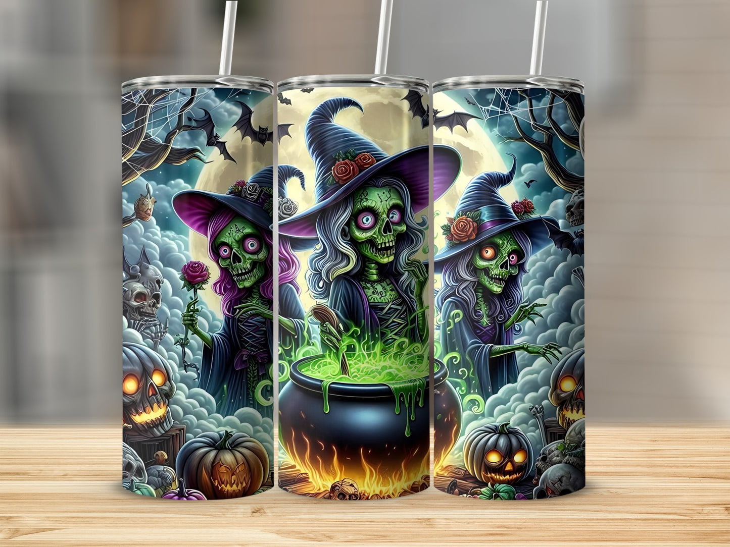 Three Halloween tumblers feature spooky witches, cauldrons, pumpkins, and skulls under a moonlit sky.