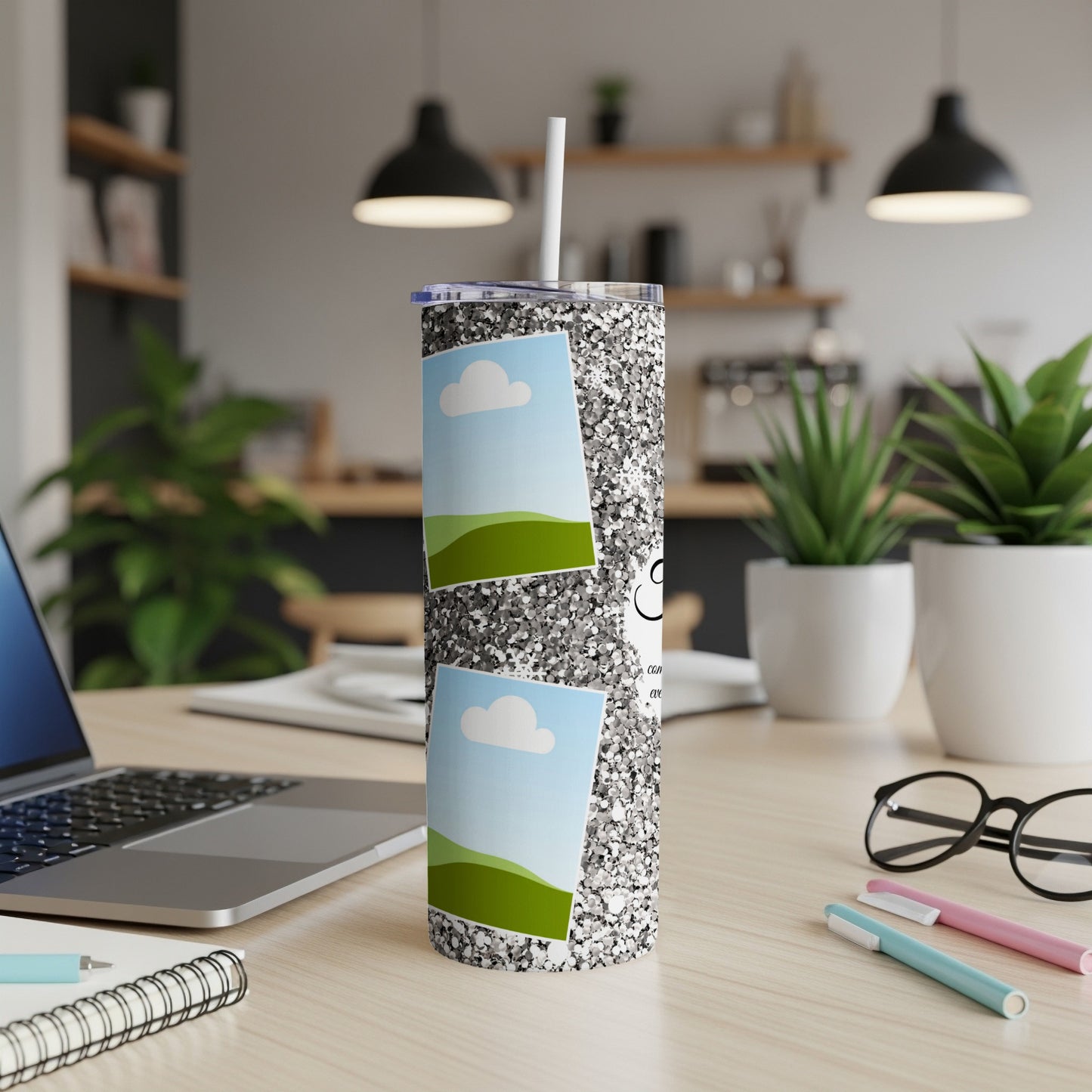 Glitter tumbler with two photo placeholders and a straw in a desk setting.