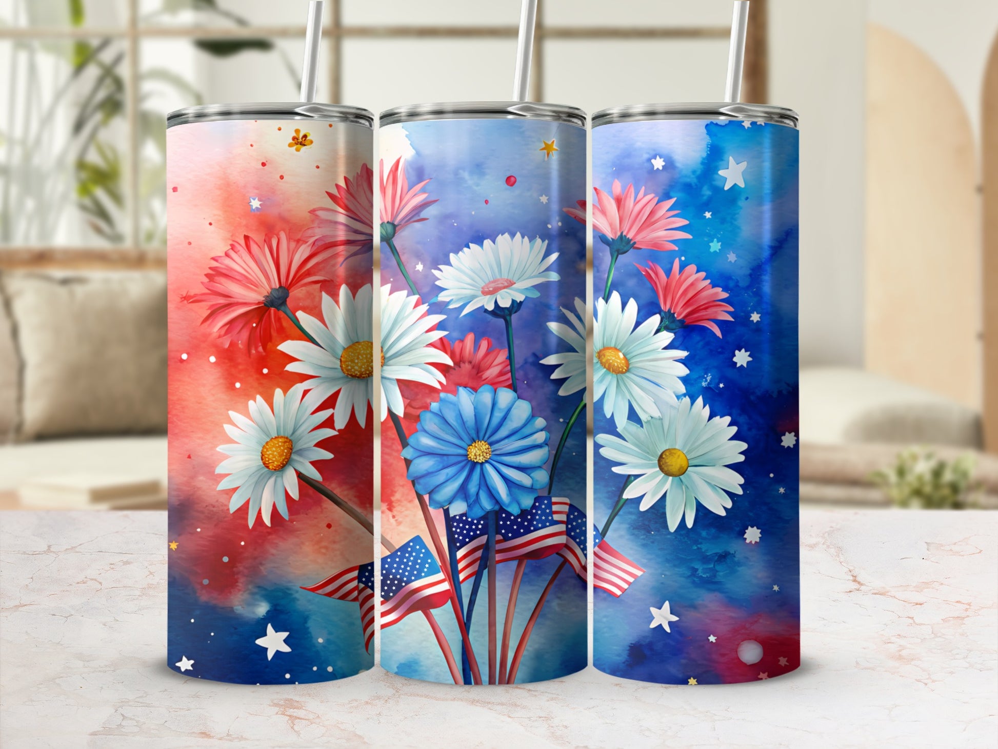 Three tumblers with patriotic floral and flag designs.