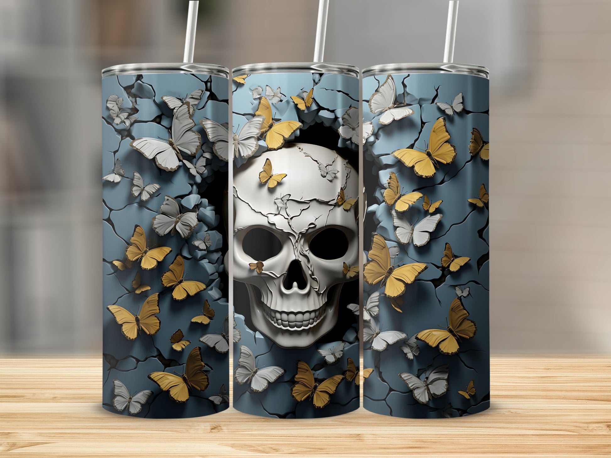 Triptych of tumblers featuring a skull with butterflies emerging from cracked walls.