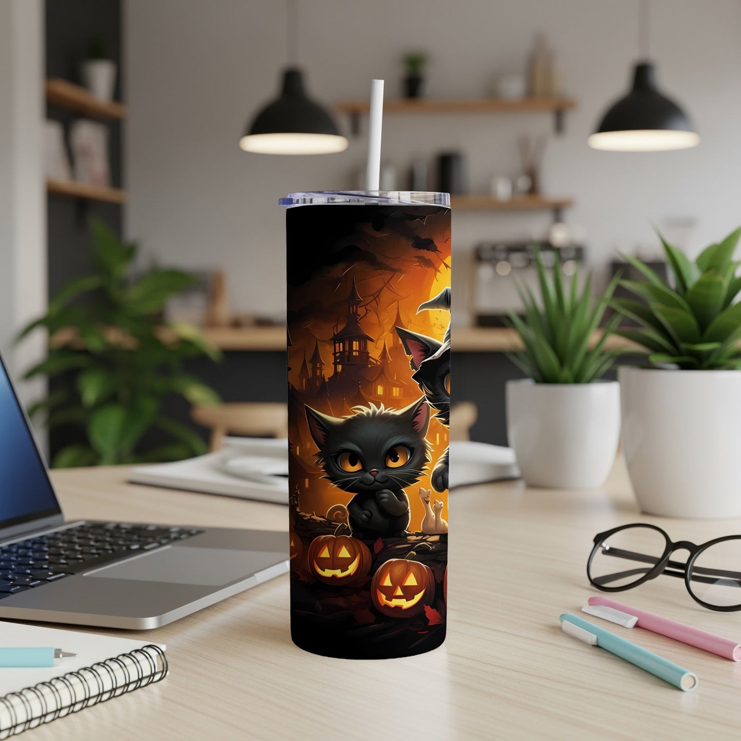 Halloween tumbler with black cats and pumpkins on a spooky night background.