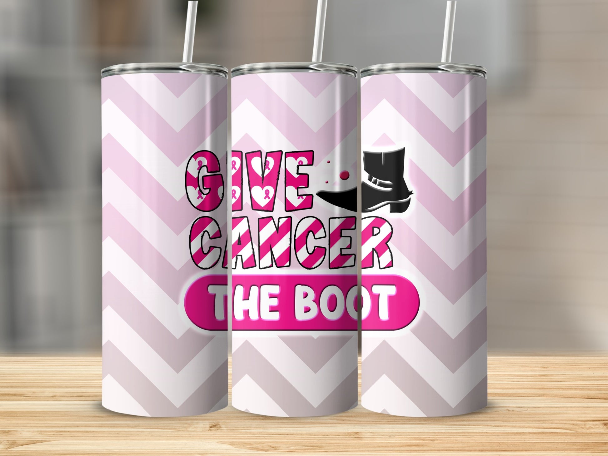 Pink ribbon graphic on tumbler with "Give Cancer the Boot" text.