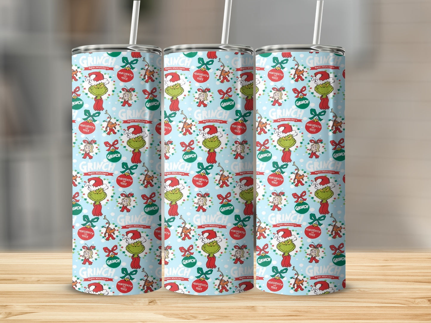 Grinch holiday tumbler with red bow and "Naughty or Nice" text.