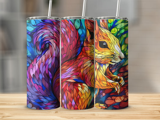 Stained glass squirrel design on three tall, slender tumblers.
