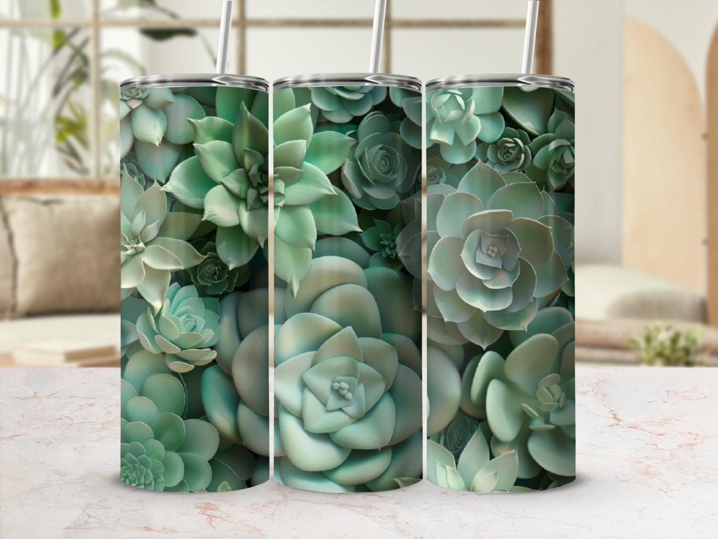 Three tumblers covered in a pattern of green succulents.