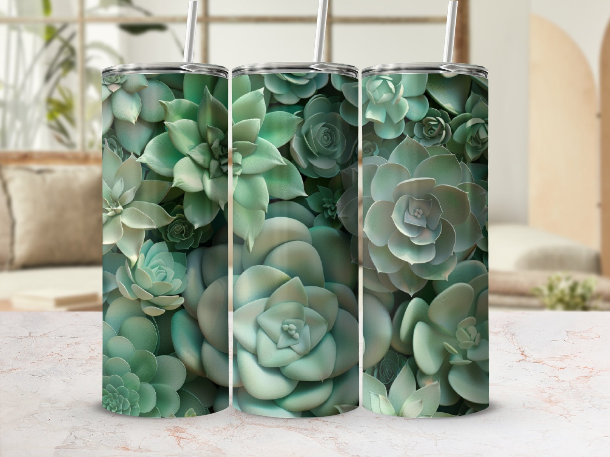 Three tumblers covered in a pattern of green succulents.