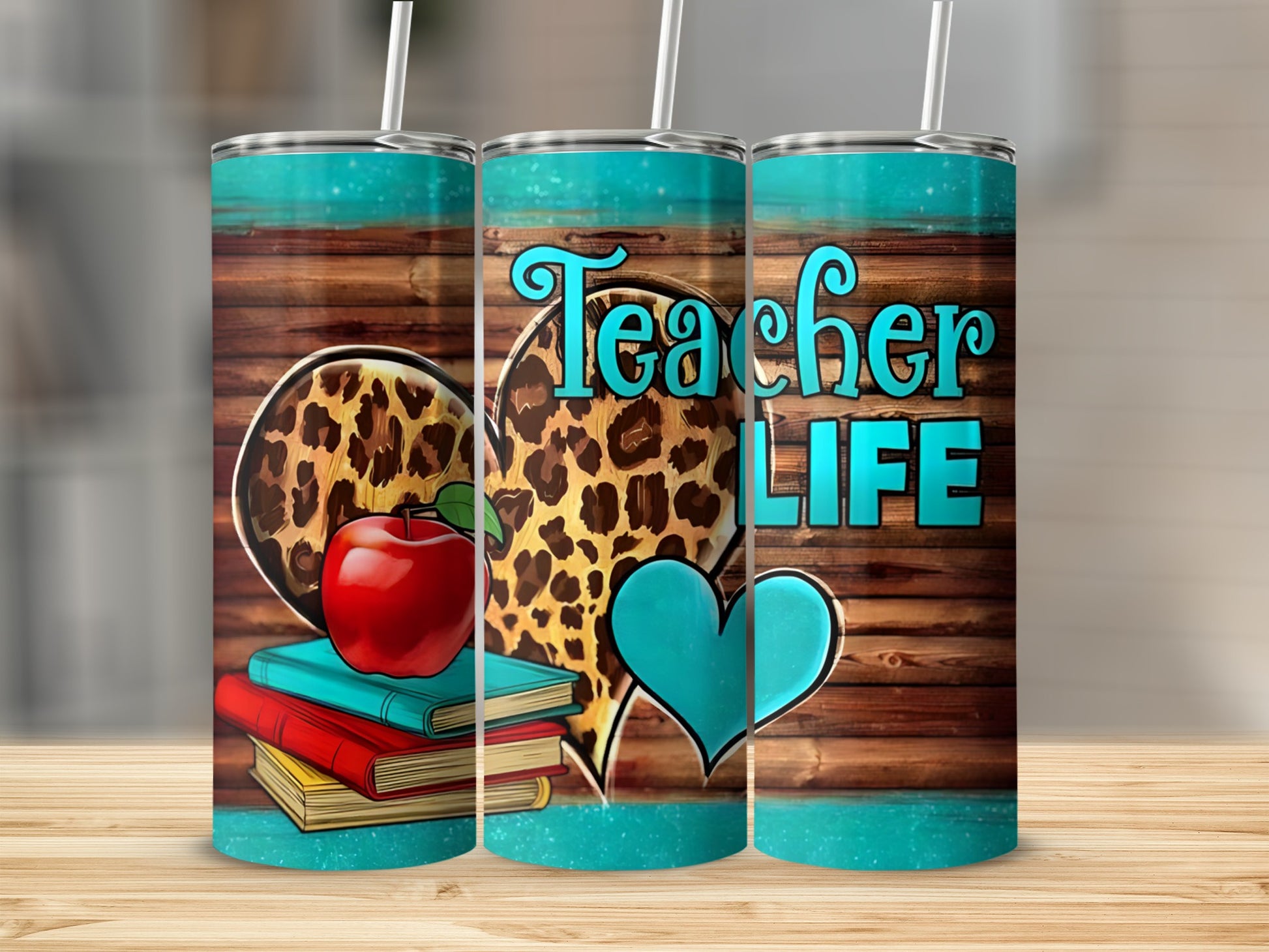 Teacher Life tumbler with apple, books, and leopard print heart.