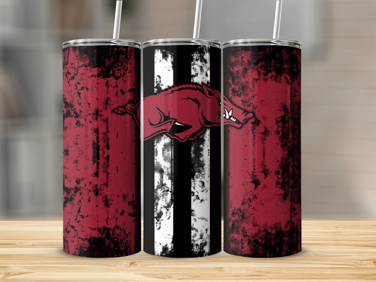 Three tumblers with a distressed red and black design featuring a running wild boar logo.