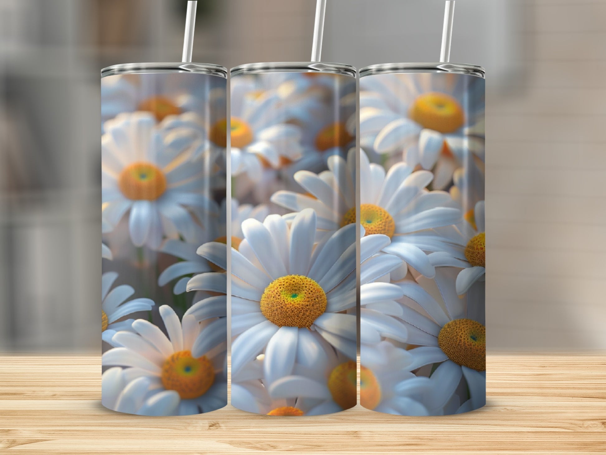 Three tumblers featuring a close-up pattern of white daisies with yellow centers.