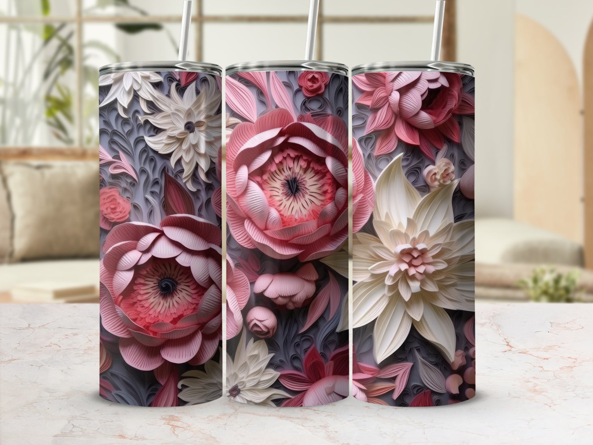 Three tumblers with a textured floral design in shades of pink and cream.