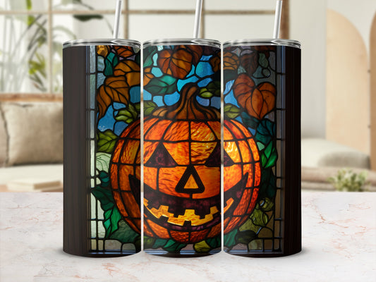 Halloween jack-o'-lantern stained glass tumbler with straw.
