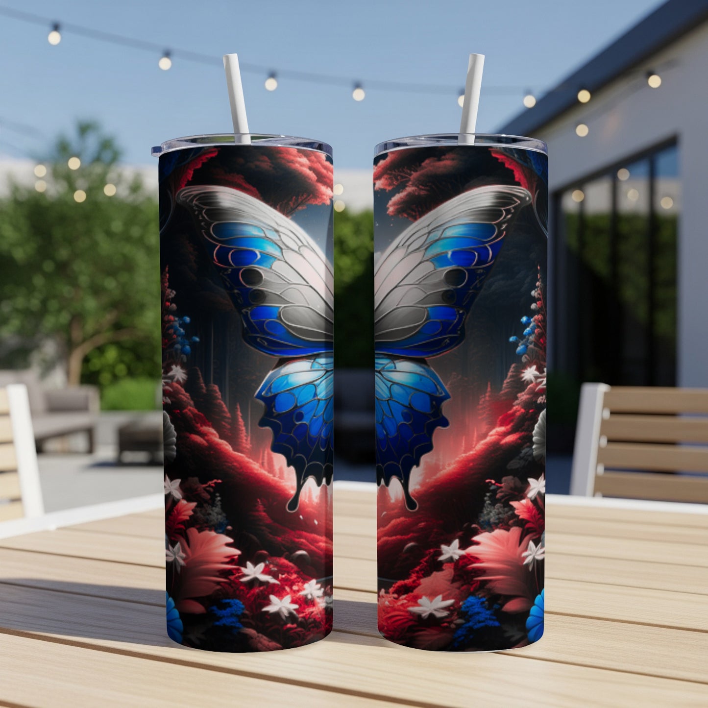 Two tumblers with iridescent blue butterfly wings and red floral designs.