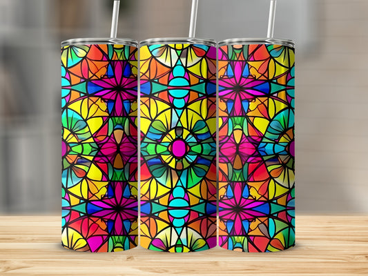 Three stained glass tumblers with colorful geometric patterns.