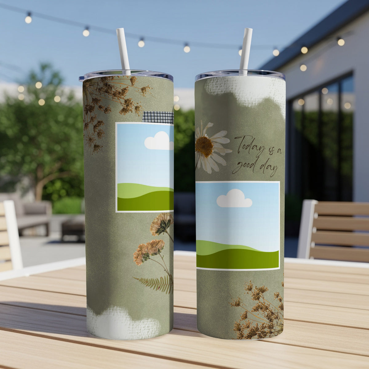 Two tumblers with dried flowers, landscape art, and "Today is a good day" text.