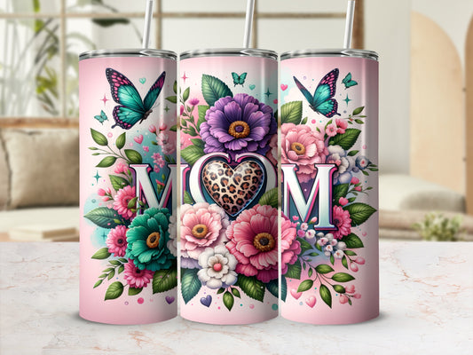Pink tumbler with butterflies and floral design, featuring "Mom" on leopard print heart.