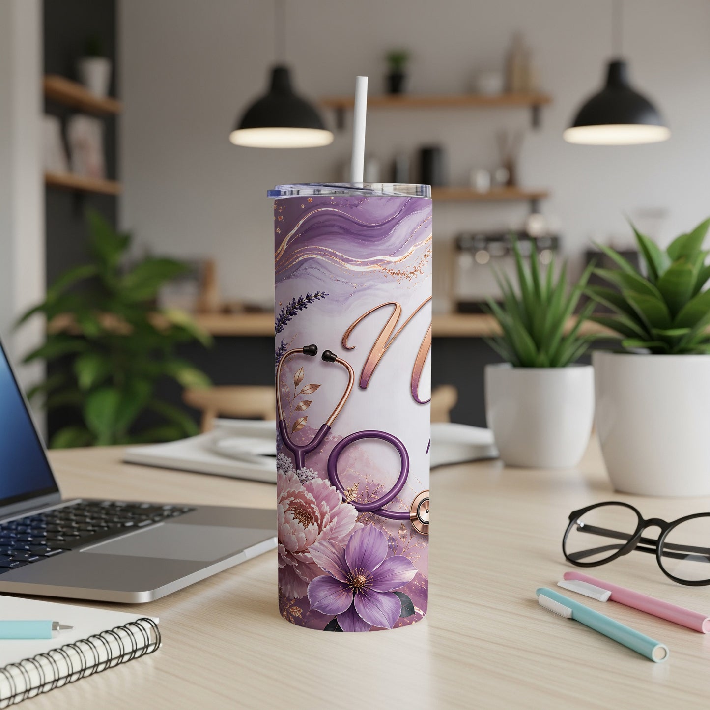 Purple marble tumbler with stethoscope and floral accents.
