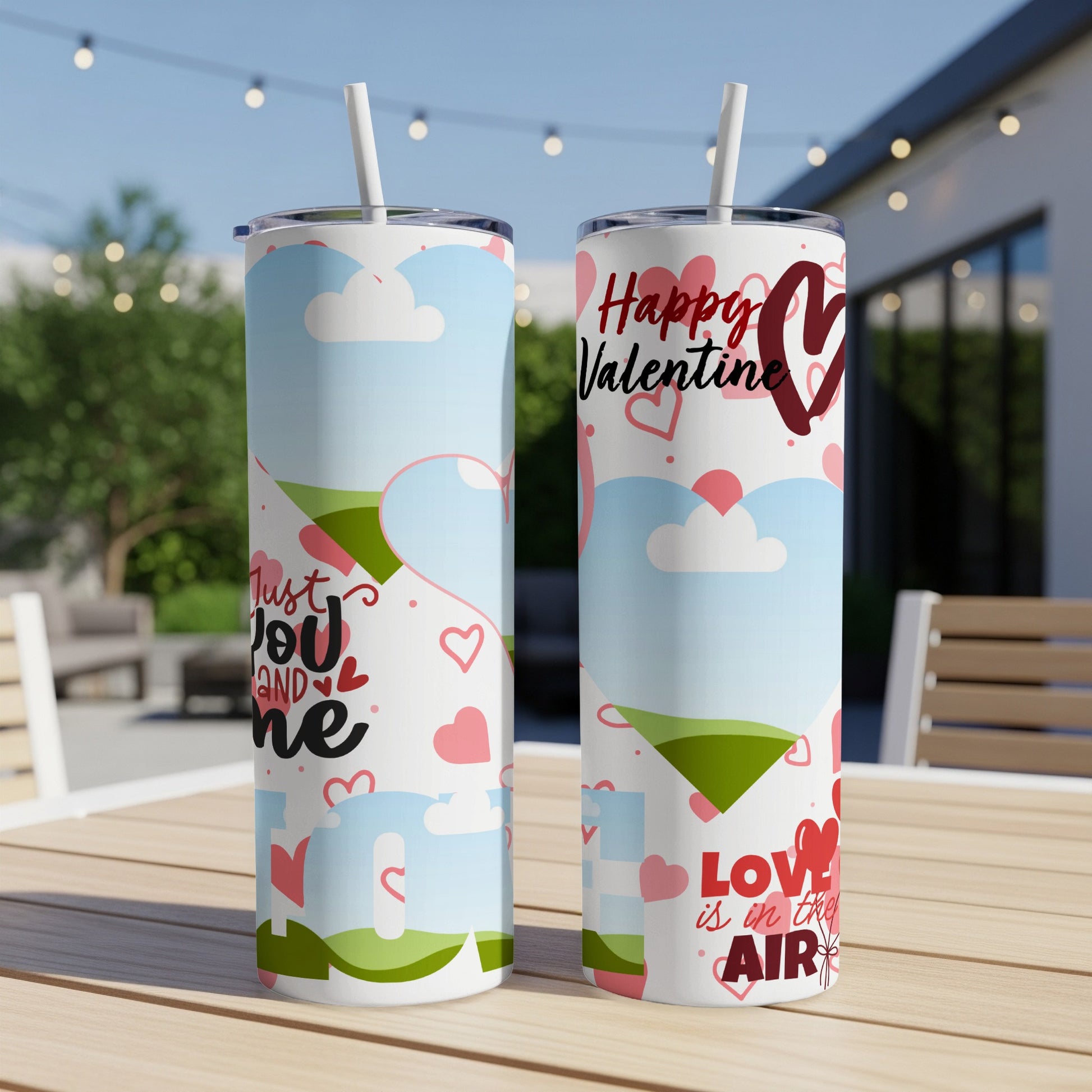 Two Valentine's Day themed tumblers with text "Just You and Me" and "Love is in the Air".