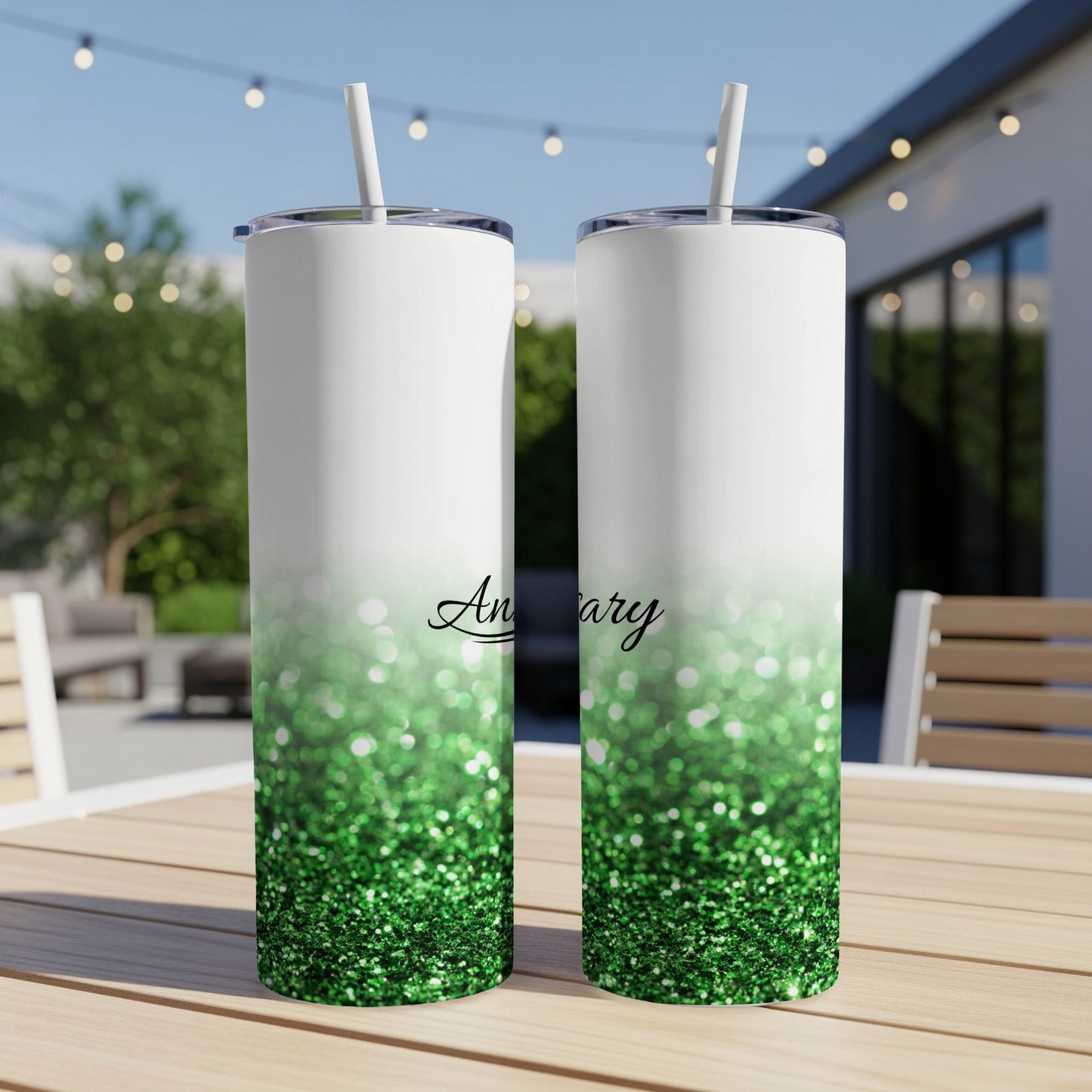 White tumbler with green glitter ombre, reading "Anniversary".