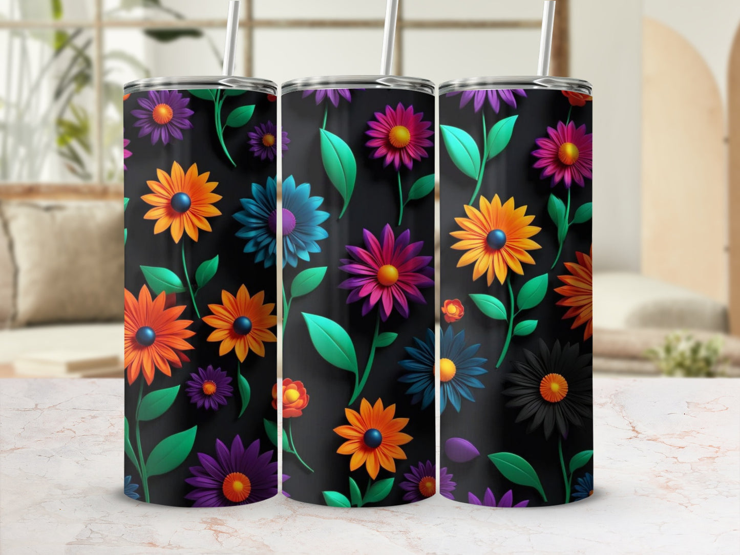 Three tumblers with a colorful floral pattern on a dark background.