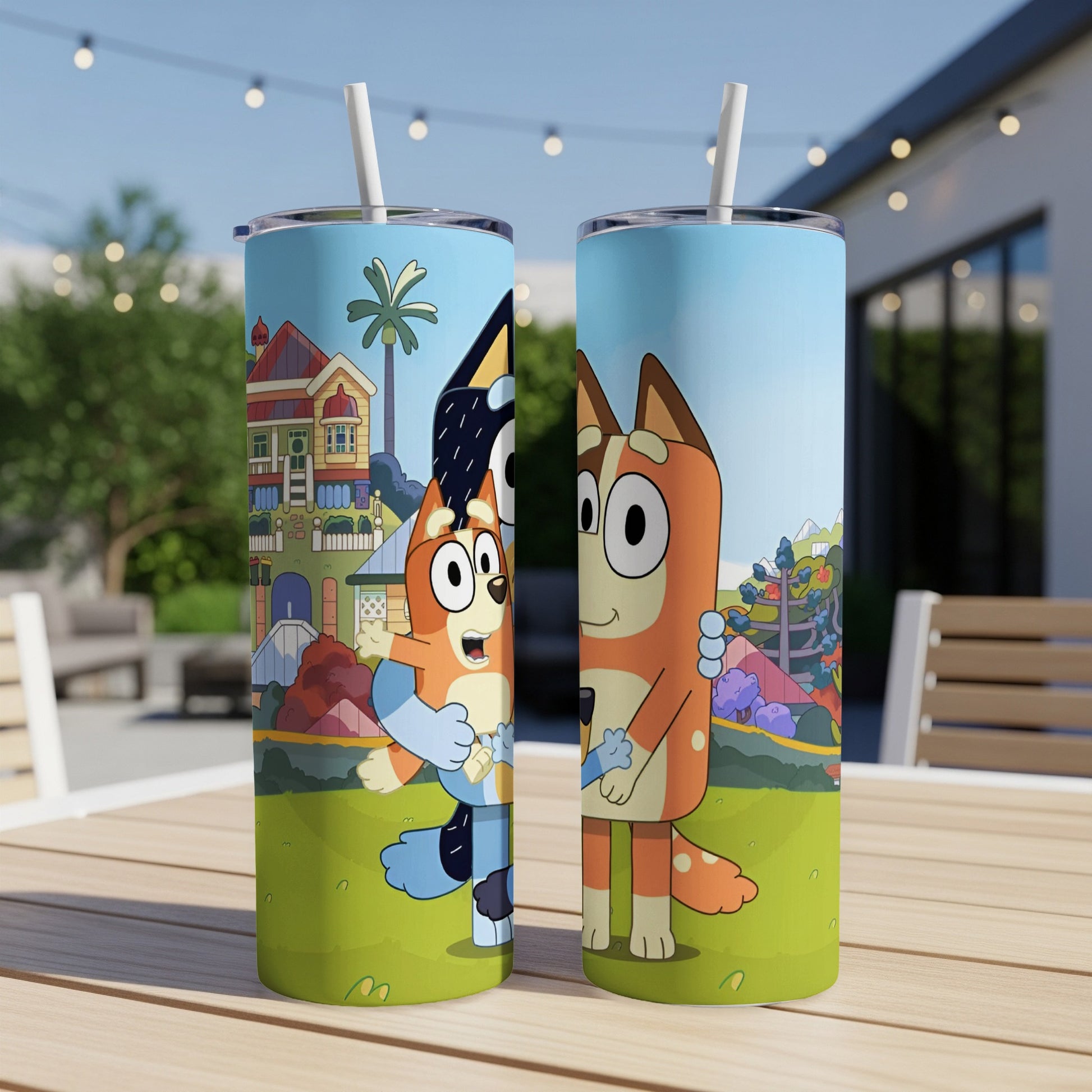 Bluey and Bingo characters on a tumbler with a backyard scene.