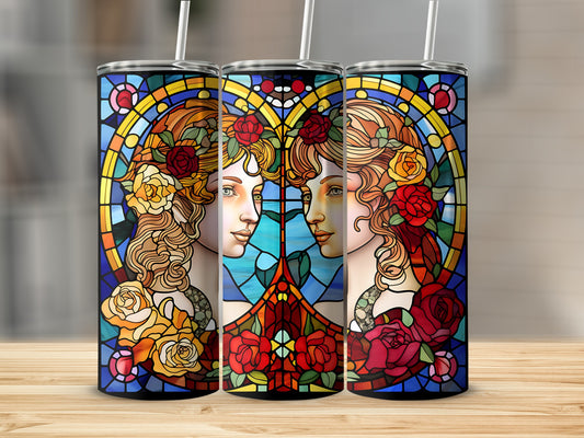 Stained glass pattern of two women's faces framed by roses and hearts.
