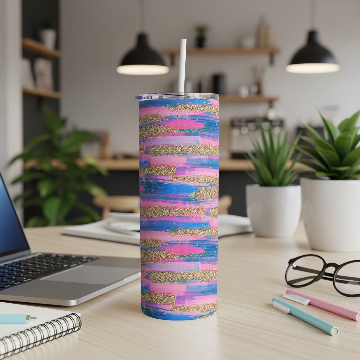 Tall insulated tumbler with pink, blue, and gold glitter stripes.