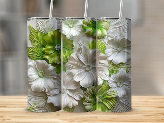 White and green floral pattern on three tall, slim tumblers.