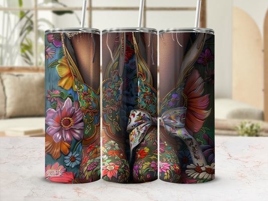 Triptych of a floral patterned cowboy boot tumbler with a straw.