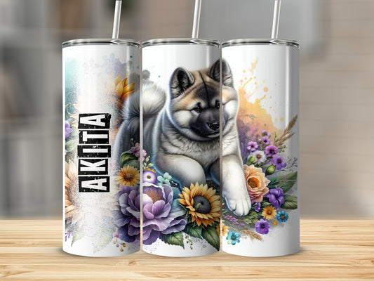 Akita dog with flowers on a white tumbler.