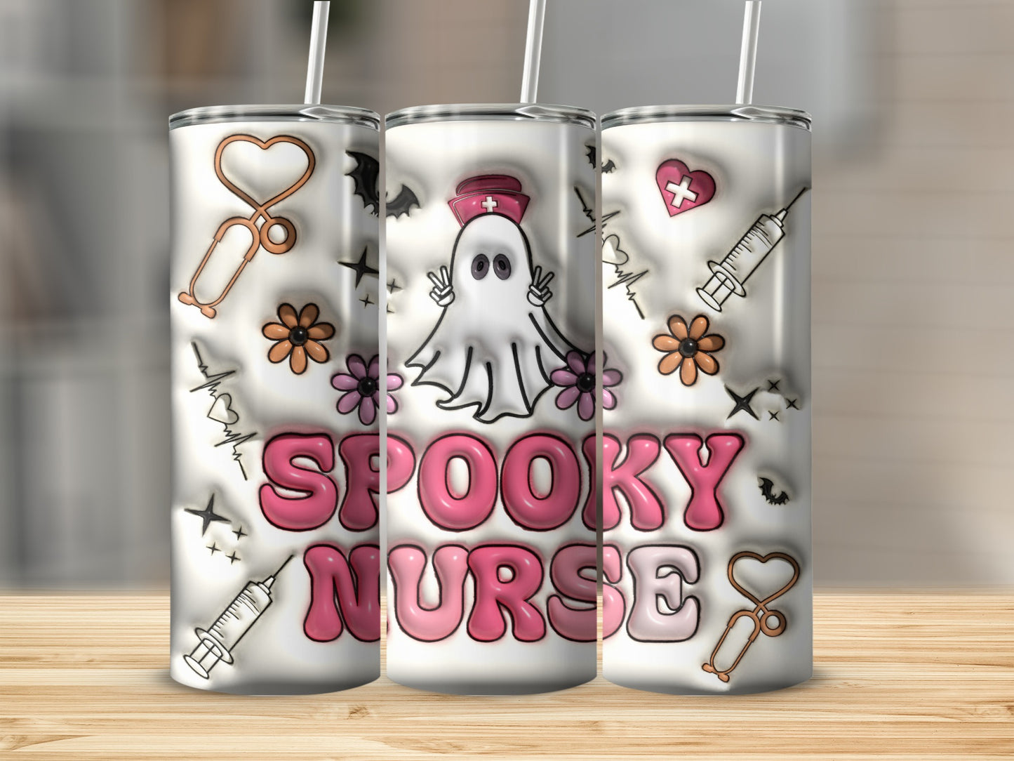 "Spooky Nurse" tumbler with ghost, hearts, and medical icons on a wooden surface.