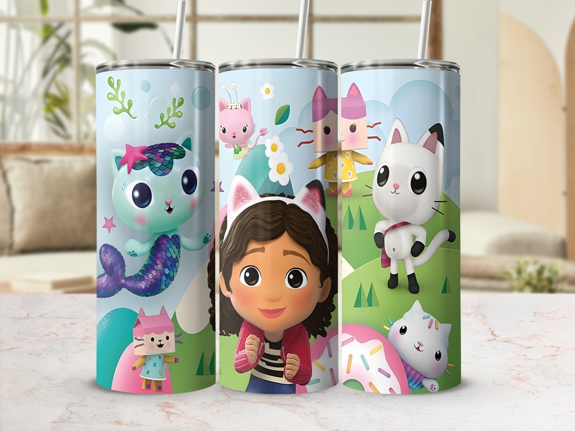 Gabby's Dollhouse tumbler with characters Gabby, Pandy Paws, and MerCat.