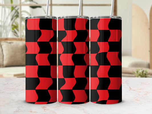 Three red and black checkered tumblers with straws on a marble surface.