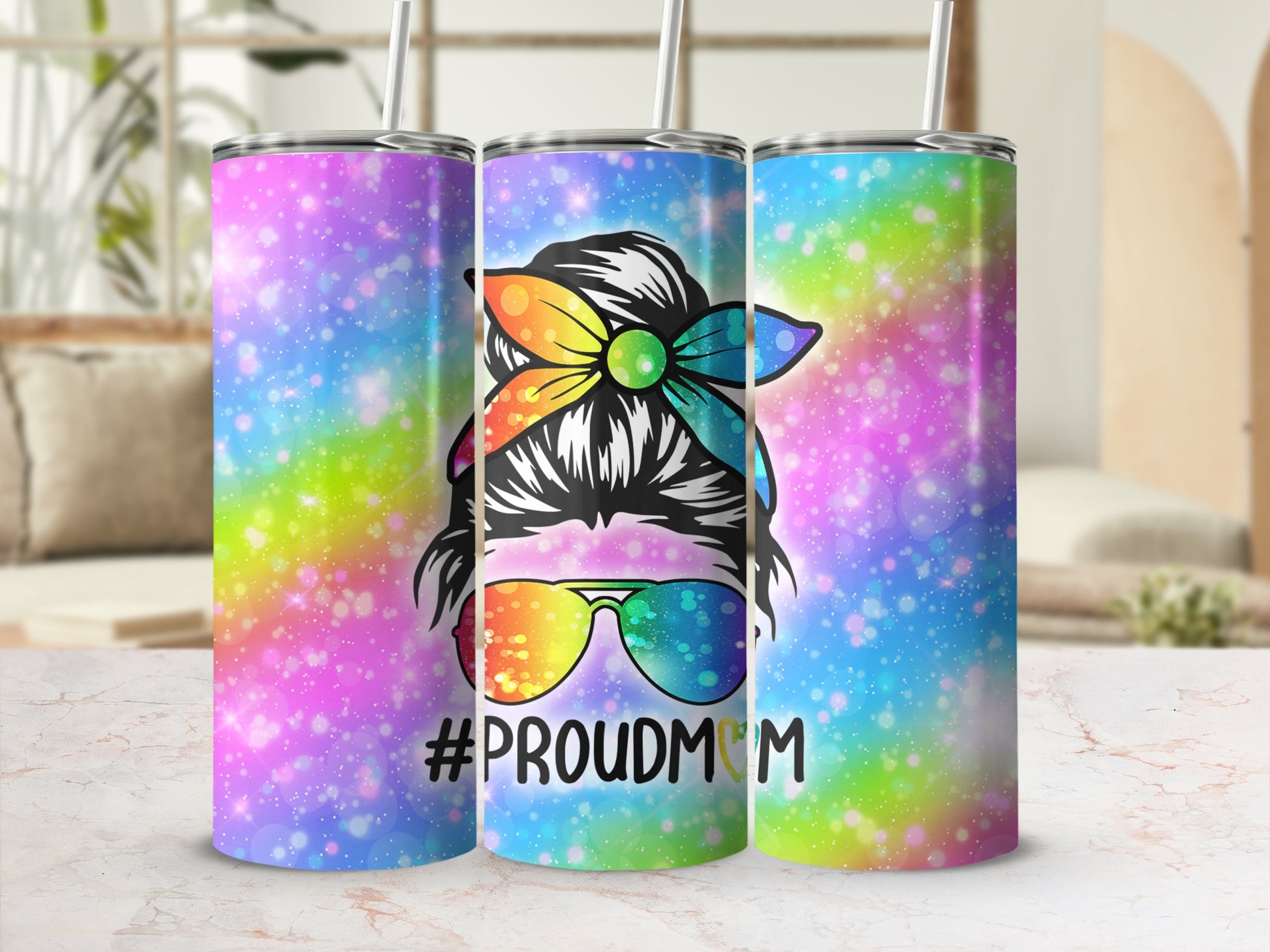 Colorful tumbler with a messy bun, sunglasses, and "#PROUDMOM".