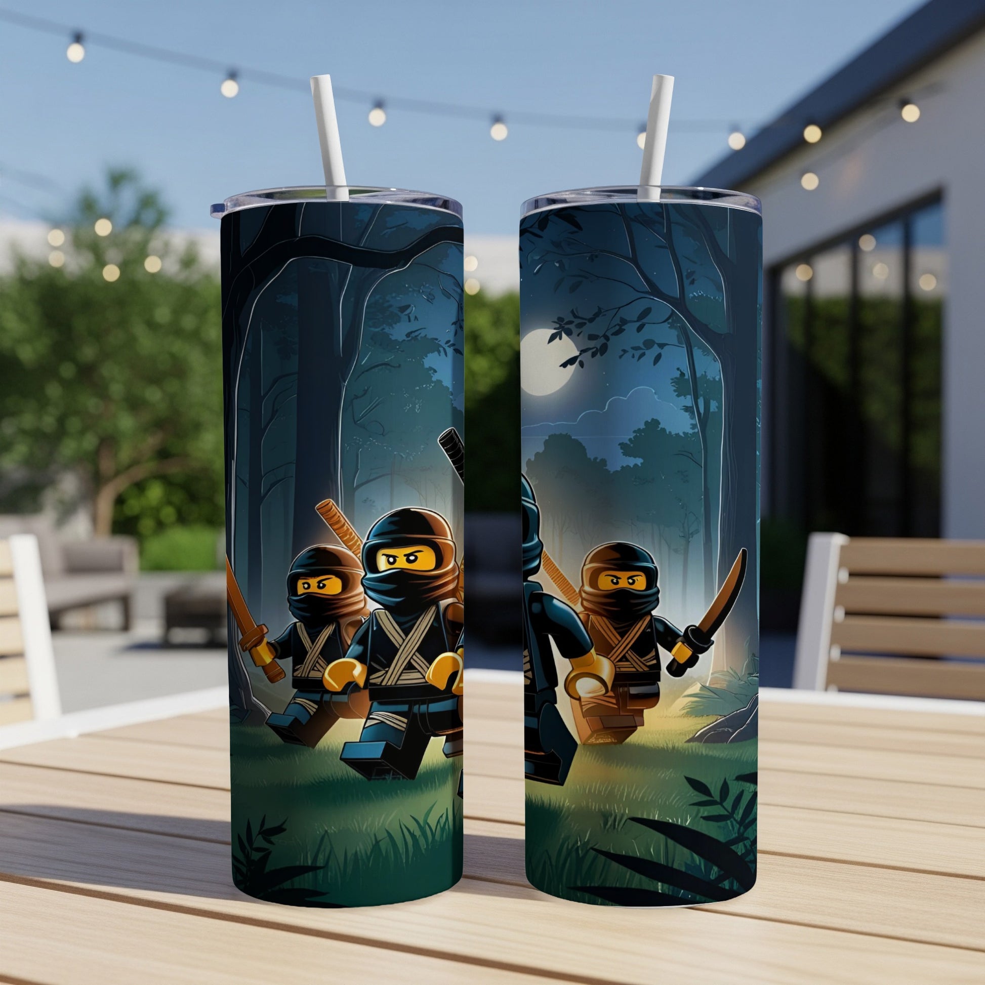 Two Ninjago tumblers with ninja characters stand on a wooden table outdoors.
