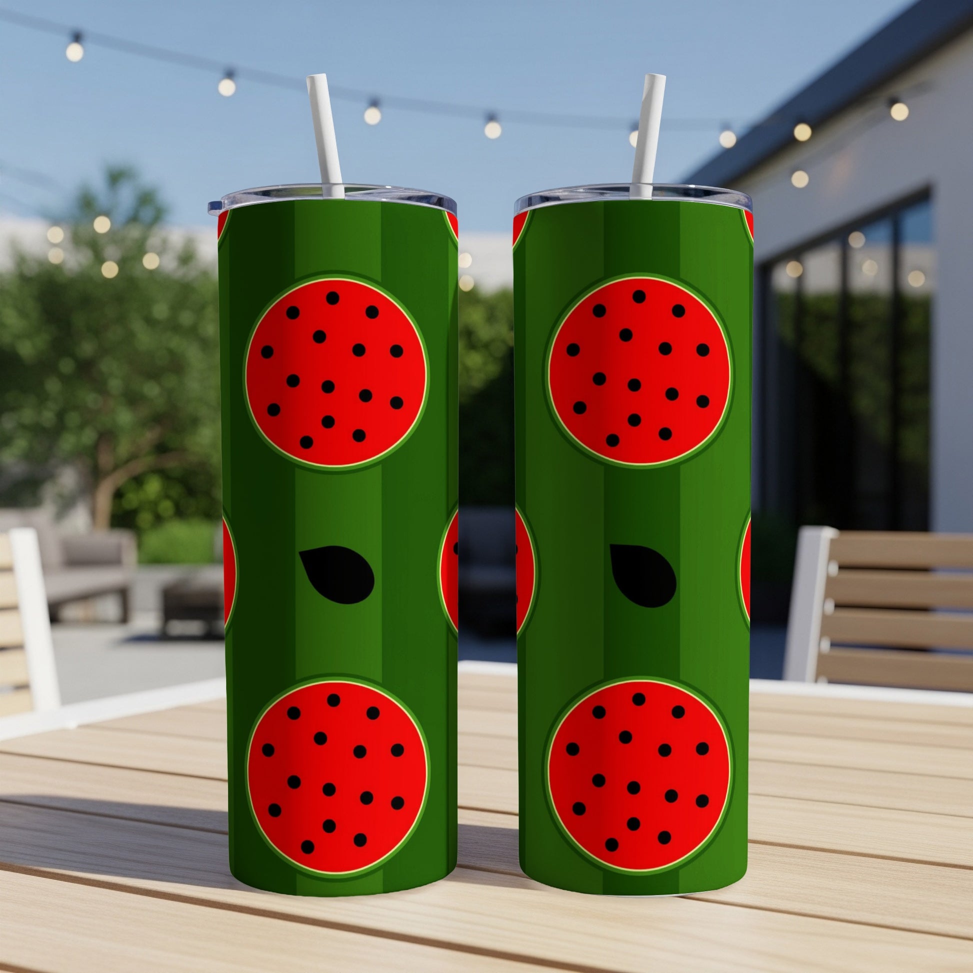Green tumbler with repeating red and black watermelon slice pattern.